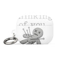 voodoo doll with pins and 'Thinking of you' text AirPods Case front view — Wandering With Pride