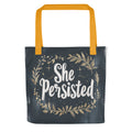 She Persisted typography with floral wreath Tote Bag front view — Wandering With Pride