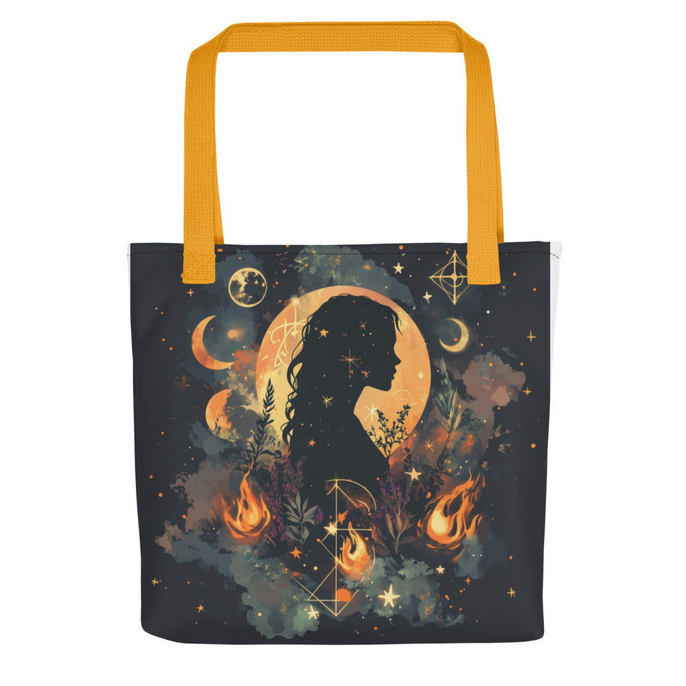 stylized illustration of a woman's profile with crescent moon, stars, flames, and leaves Tote Bag front view — Wandering With Pride