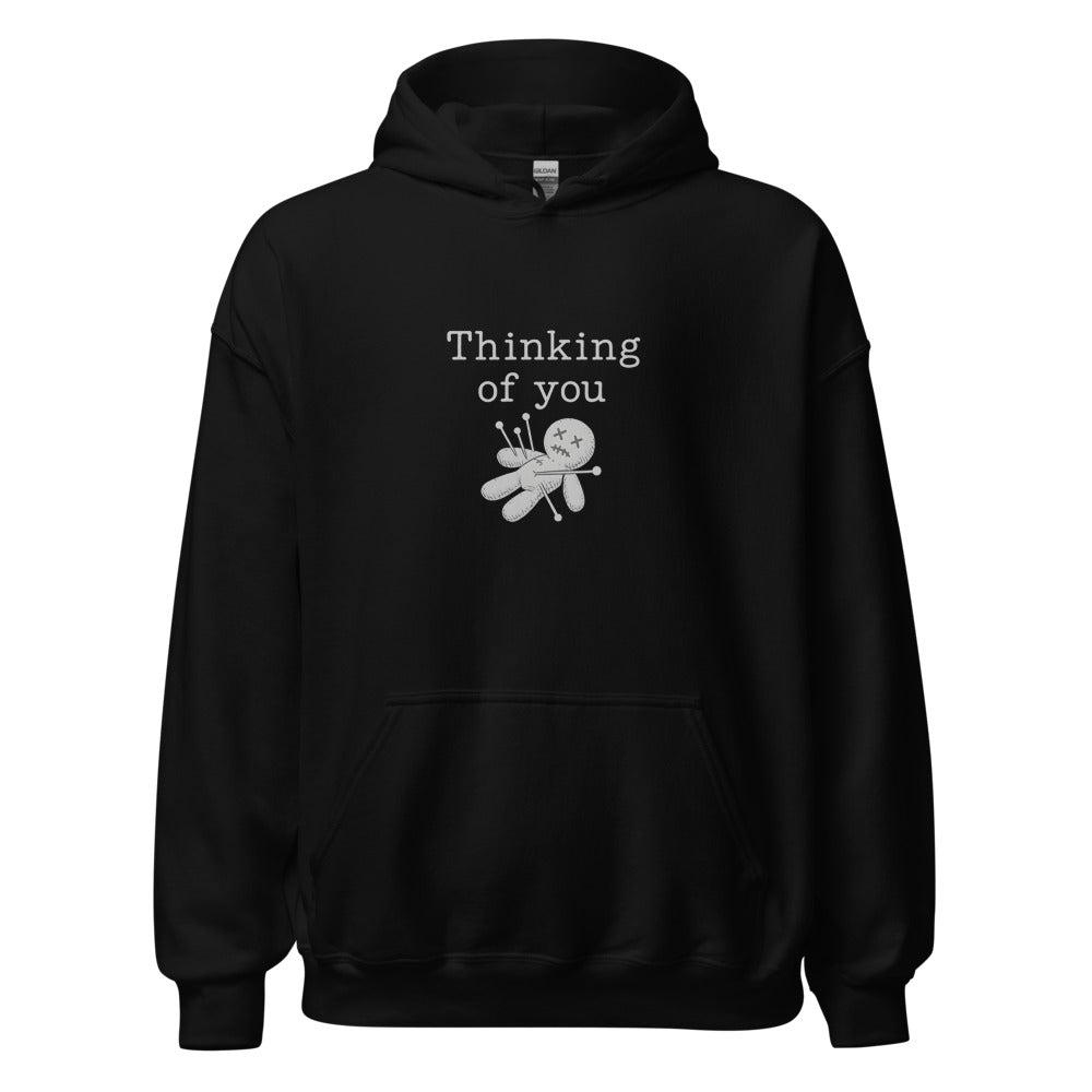 voodoo doll with pins and 'Thinking of you' text Hoodie front view — Wandering With Pride