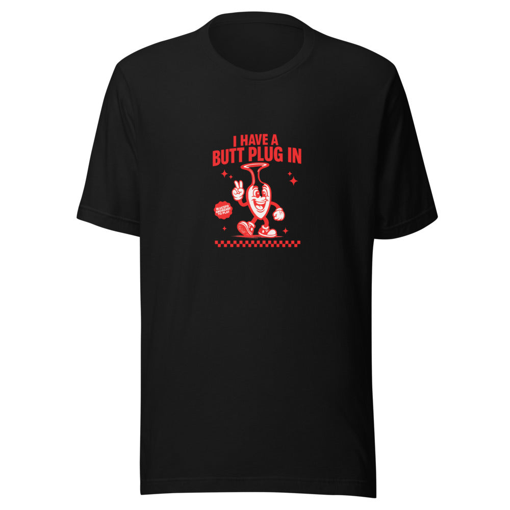 cartoon butt plug illustration holding sign that says 'I have a butt plug in' Tee front view — Wandering With Pride