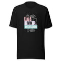 person on couch surrounded by recession symbols (laptop, coffee, phone, book, newspaper) Tee front view — Wandering With Pride