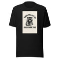 cartoon raccoon holding coffee with straw, surrounded by text 'HANG ON, LET ME OVERTHINK THIS' Tee front view — Wandering With Pride