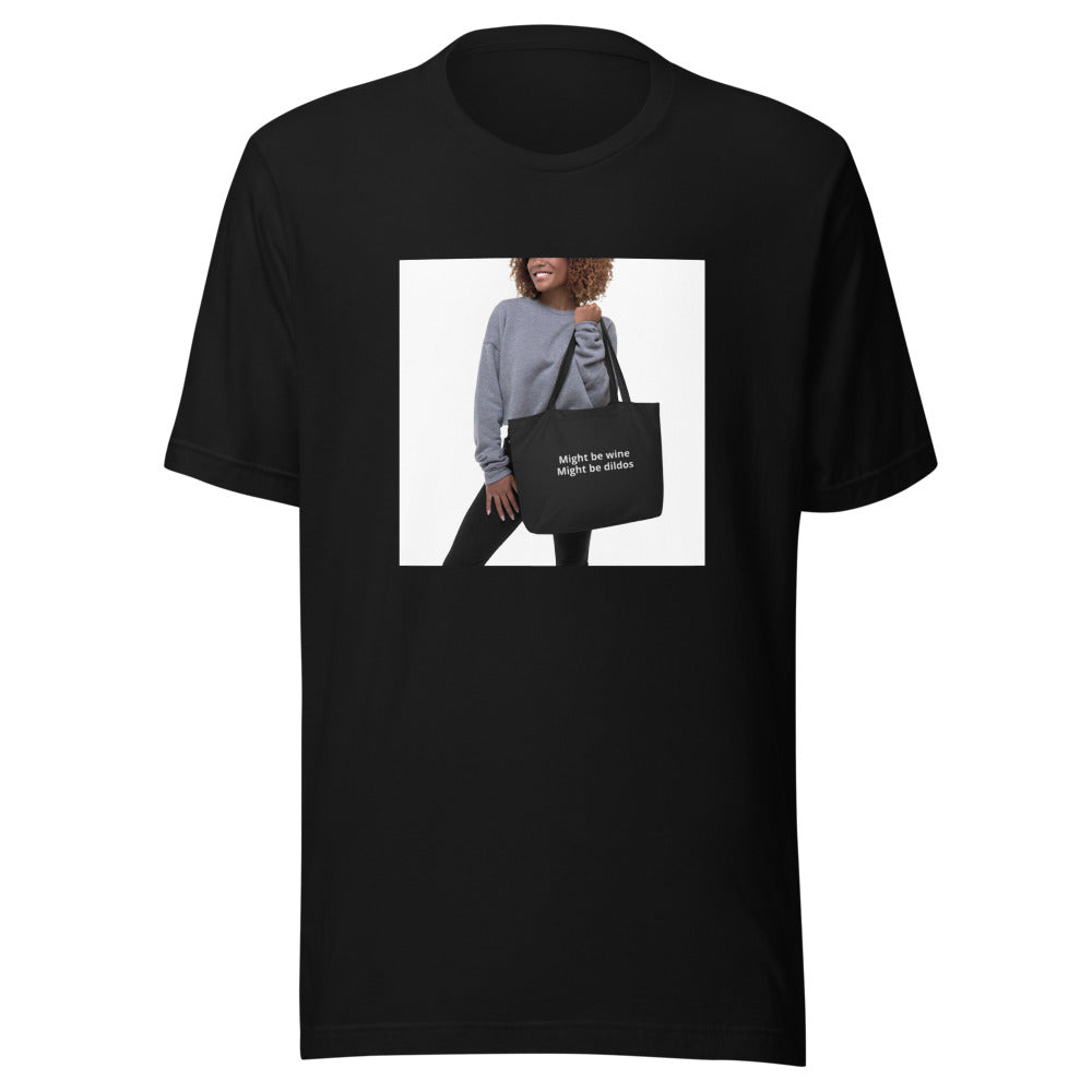 woman holding tote bag with text 'Might be wine. Might be dildes.' Tee front view — Wandering With Pride