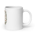 stylized modern Mona Lisa illustration with text 'THEY DIDN'T BURN WITCHES, THEY BURNED WOMEN' 11oz Mug front view — Wandering With Pride